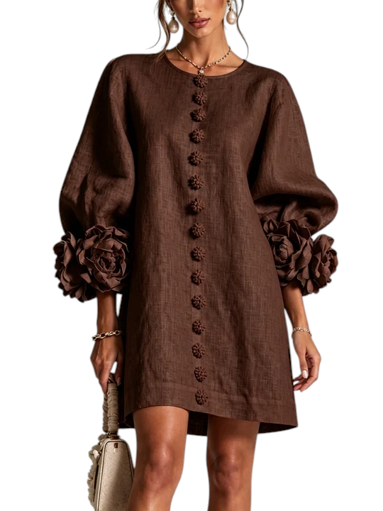Vestido corto Mara Domínguez de lino marrón con mangas abullonadas y detalles de flores artesanales en los puños