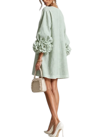 Vestido corto Mara Domínguez de lino verde menta con mangas abullonadas y detalles florales en los puños